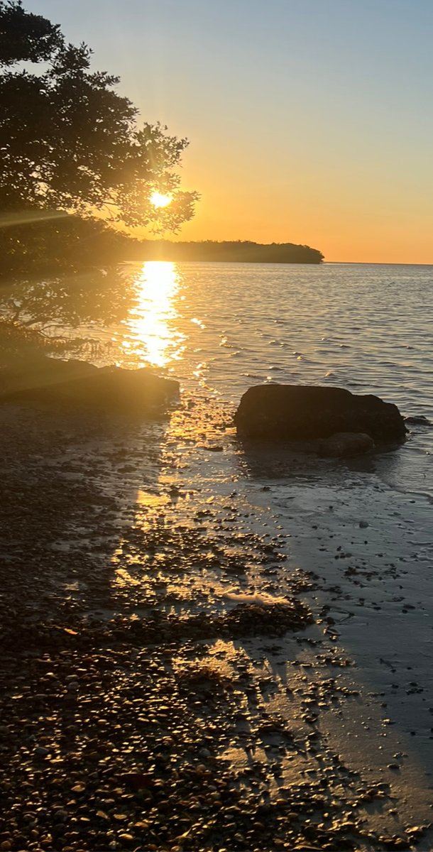 Sunset over the beachy water